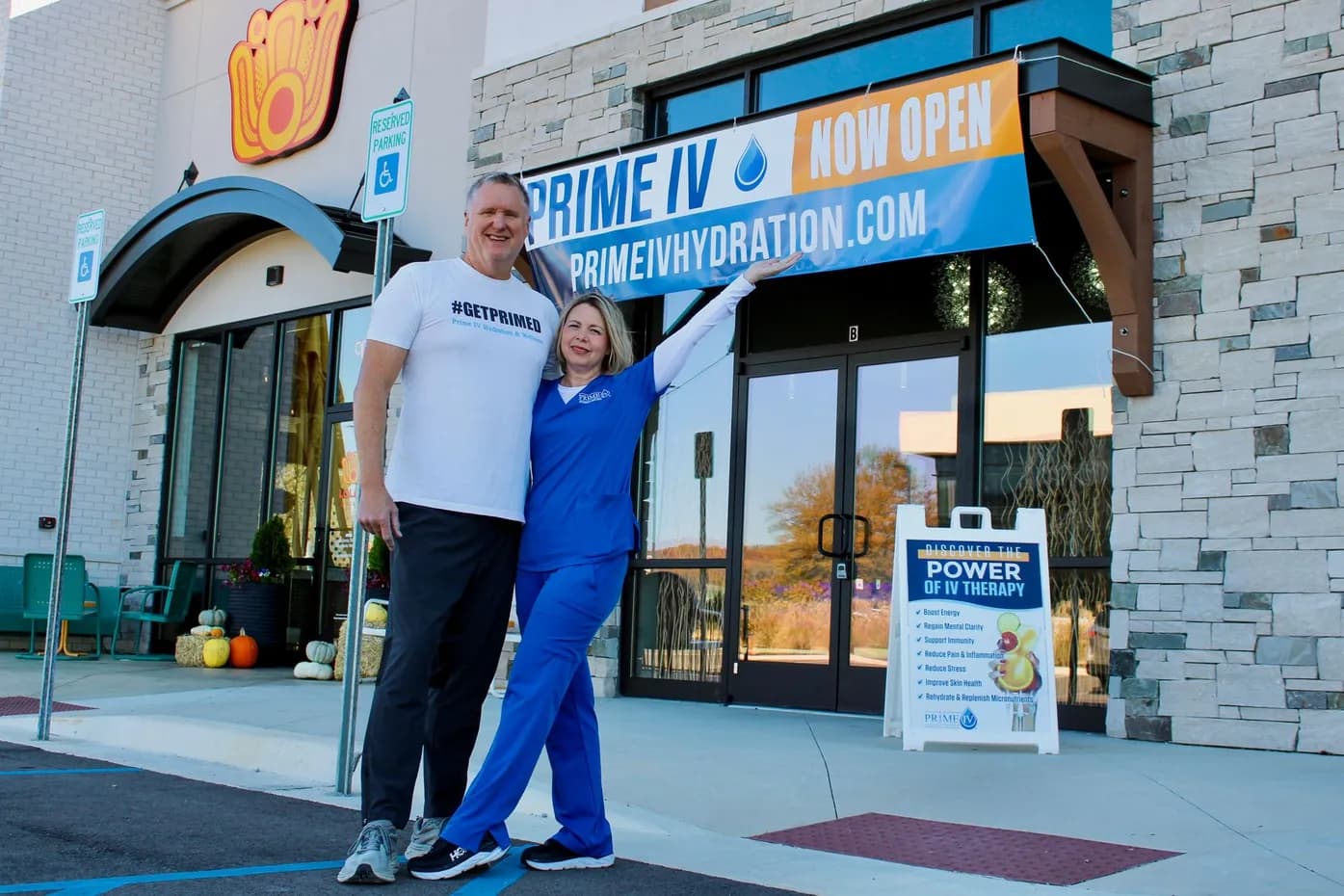 Owners Ann and John Van Steenburgh outside the Prime IV Hydration & Wellness grand opening in Huntsville, AL
